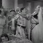 Shemp being 'awarded' with the king's homely daughter in the Three Stooges short film, Mummy's Dummies