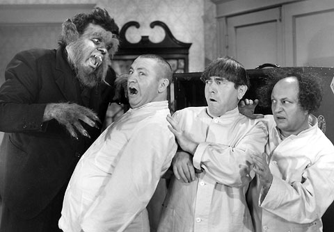 Lupe the Wolf Man menaces the Three Stooges (Curly, Moe, Larry) in Idle Roomers