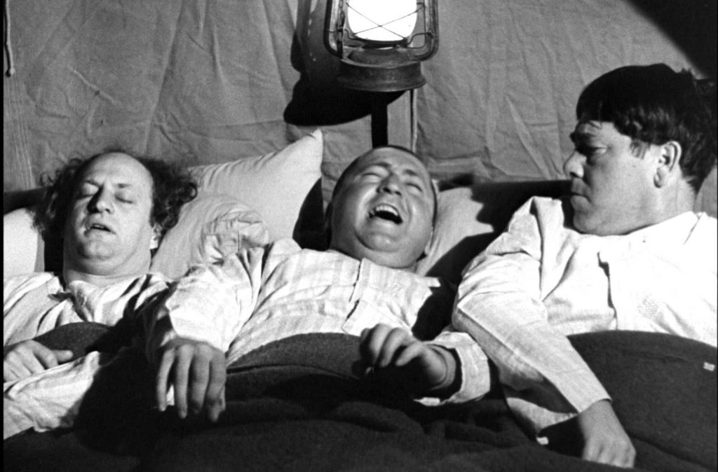 Three Missing LInks - the Three Stooges (Larry, Curly, Moe) in a tent in Africa