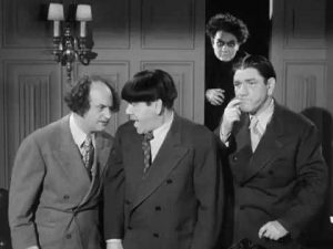 Larry, Moe, and Shemp being pursued by Nikko