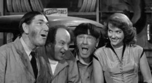 Shemp, Larry, and Moe pay attention to Benny Rubin's girlfriend … which Benny doesn't like!