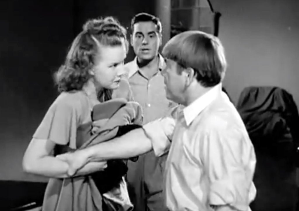 Gale Storm, Moe Howard, and Phil Regan in "Swing Parade of 1946"