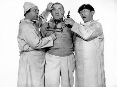 Publicity photo of Larry Fine, Curly Howard, Moe Howard in "Monkey Businessmen"