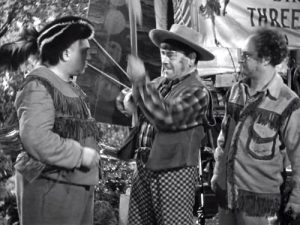 Curly, Moe, and Larry as frontiersmen in "Rockin' Thru the Rockies"