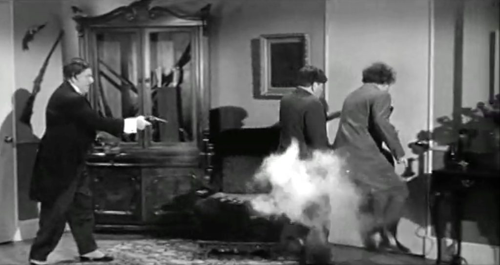 All's well in the end - Shemp shoots the fleeing Moe and Larry in the posterior, ending "Husbands Beware"