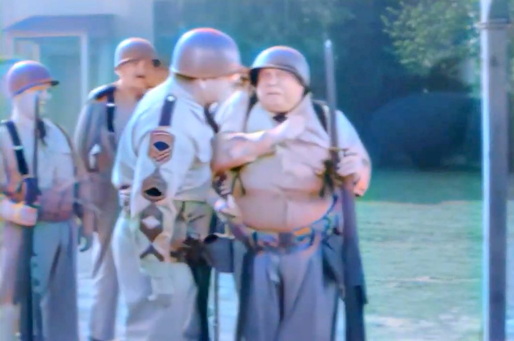 Suffering Army sergeant and incompetent Private Joe Besser doing bayonet practice 