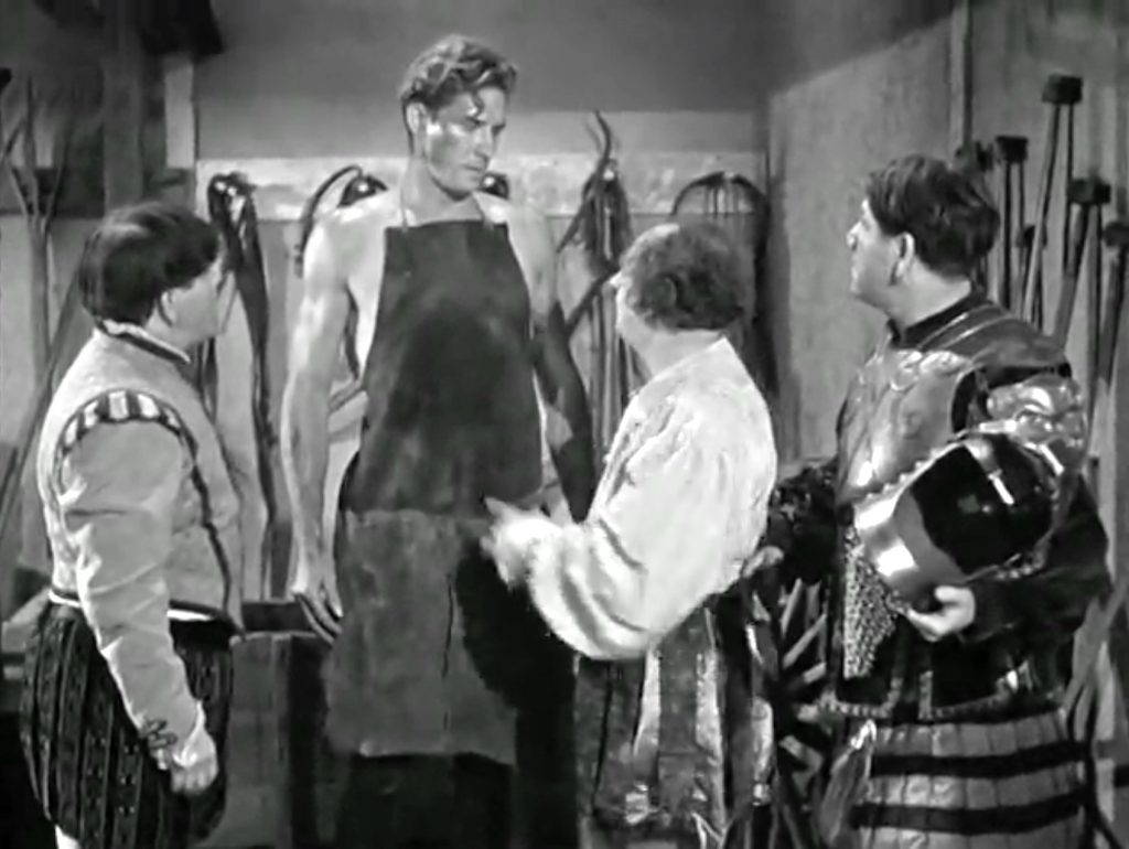 Cedric the blacksmith (Jock Mahoney) meets the Three Stooges (Moe, Larry, Shemp)