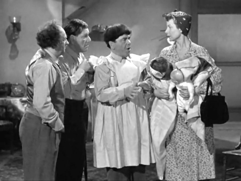 Moe, Larry, and Shemp explain to their landlady why they "borrowed" her daughter's dolls - to practice as babysitters