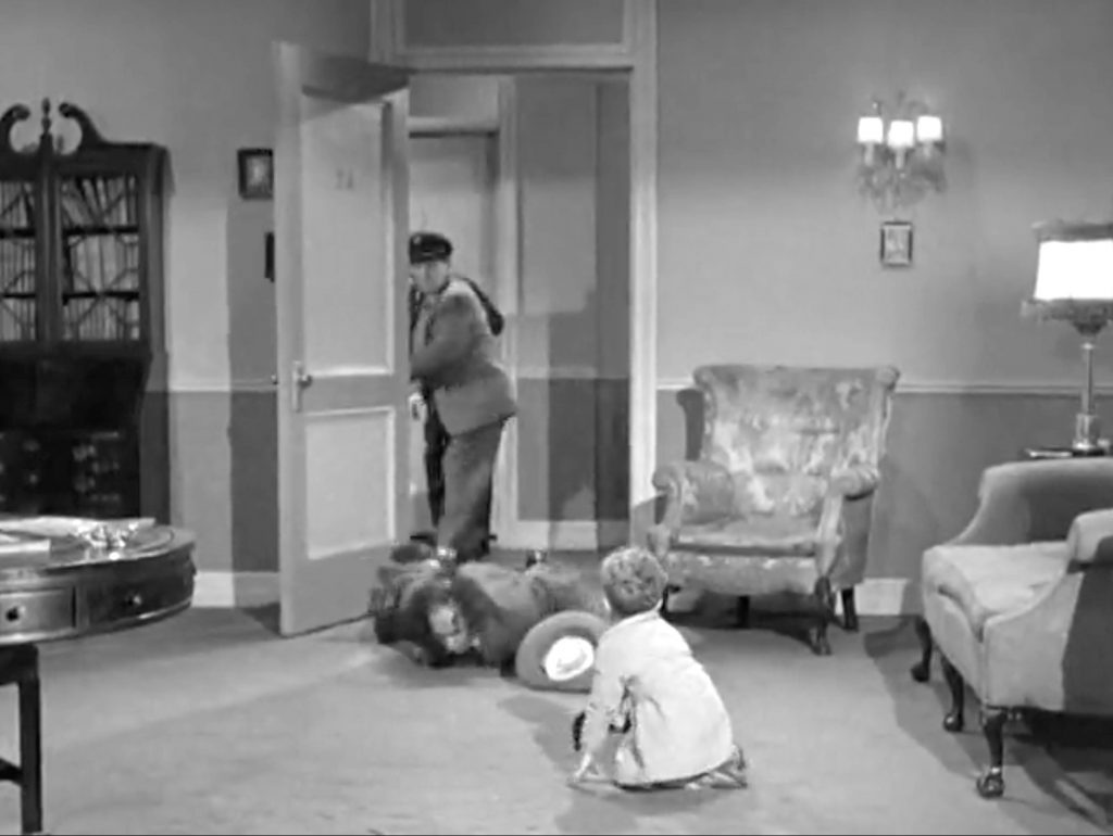 The Three Stooges find Junior in his father's apartment
