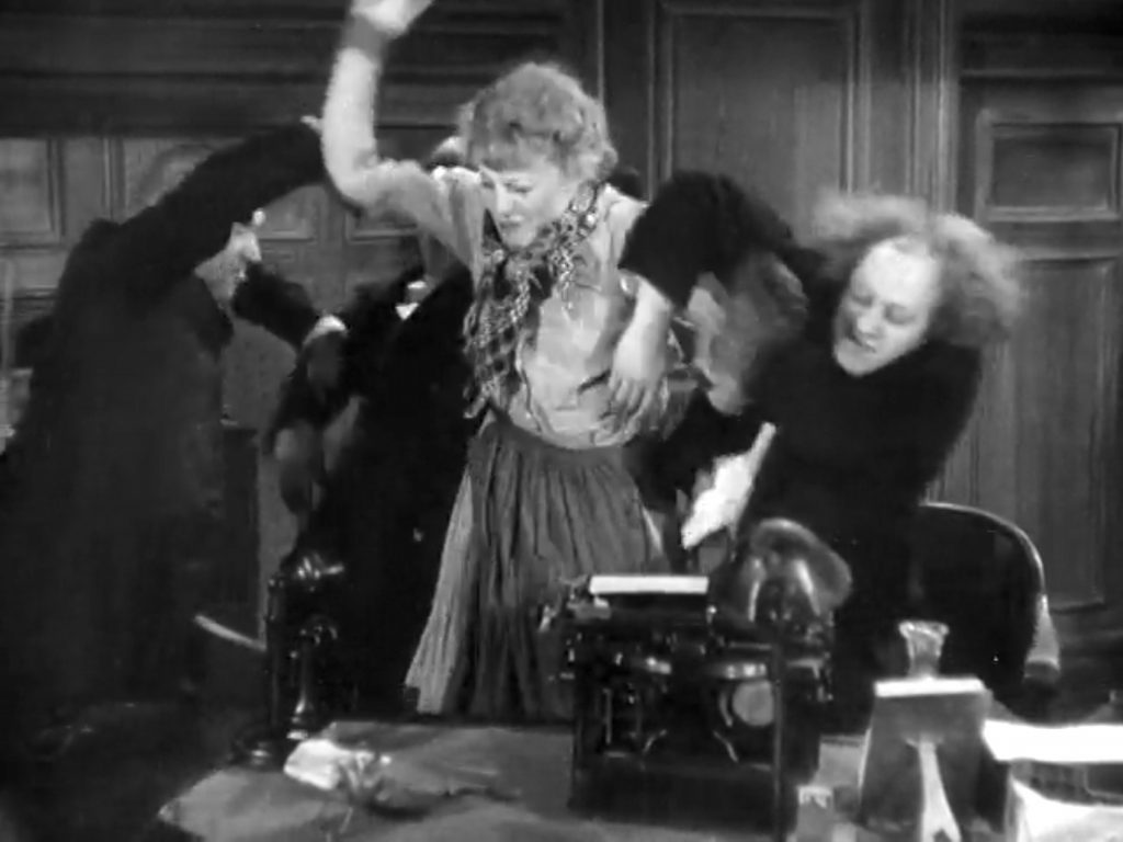 "I saw her first!" The Three Stooges (Moe, Larry, Curly) accost the cleaning lady (Bonnie Bonnell) in "The Big Idea"