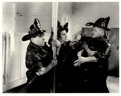 Moe, Larry, and Curly at the fire pole in "False Alarms"