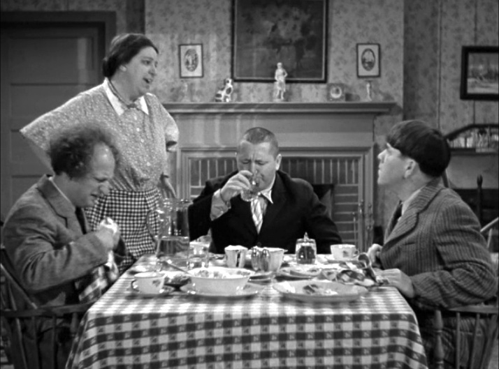 Oily to Bed, Oily to Rise - the Widow Jenkins kindly offers the Three Stooges (Larry, Curly, Moe) a chicken dinner