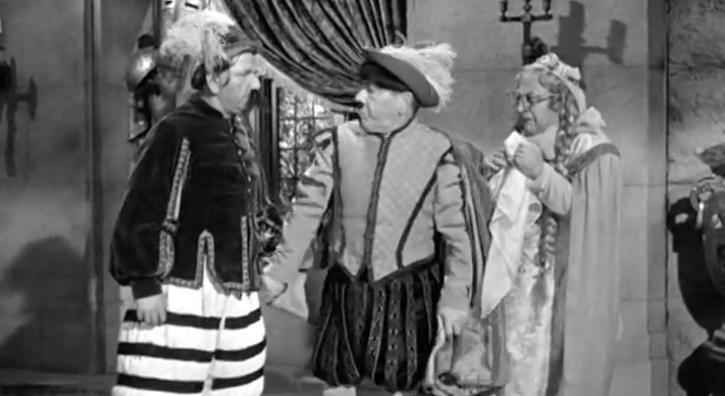 The Three Stooges putting on their play for the Princess Elaine