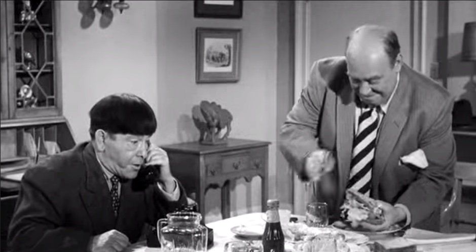 Quiz Whizz - Moe Howard is on the phone worried about Joe Besser, while Joe's making a sandwich