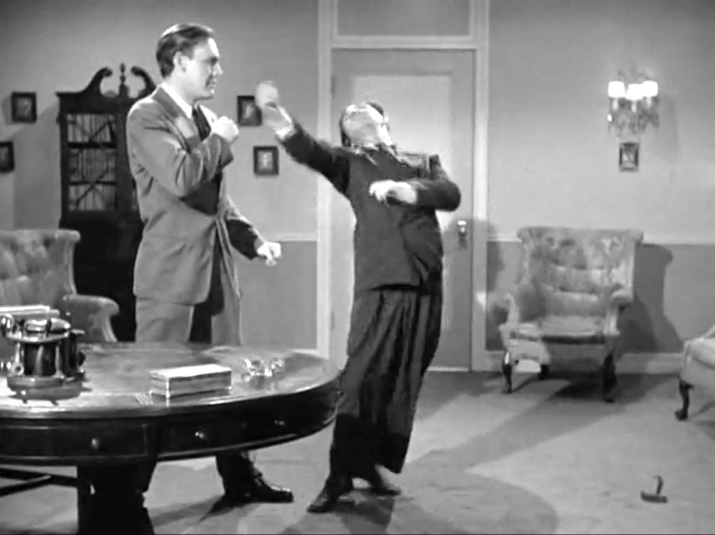 Shemp tries to use his boxing skills on Junior's father in "Baby Sitters Jitters"
