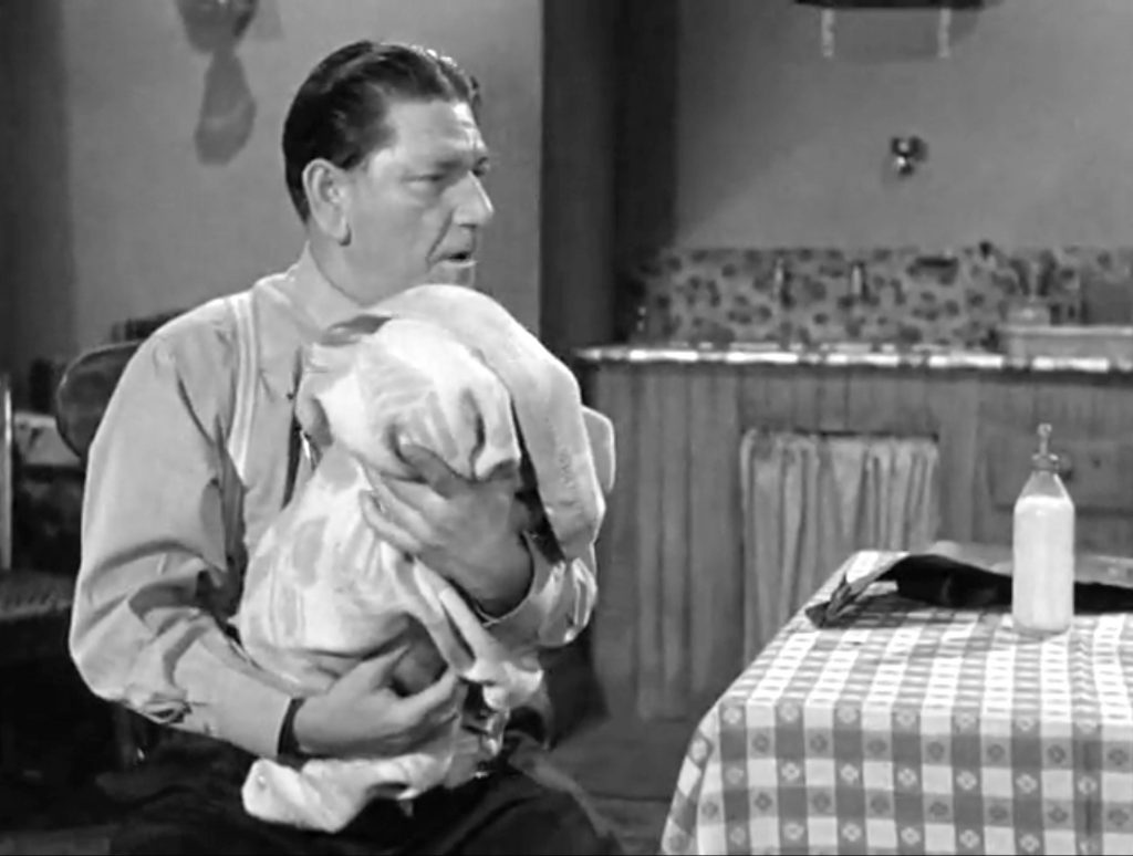 Shemp practicing to be a baby sitter in "Baby Sitters Jitters"