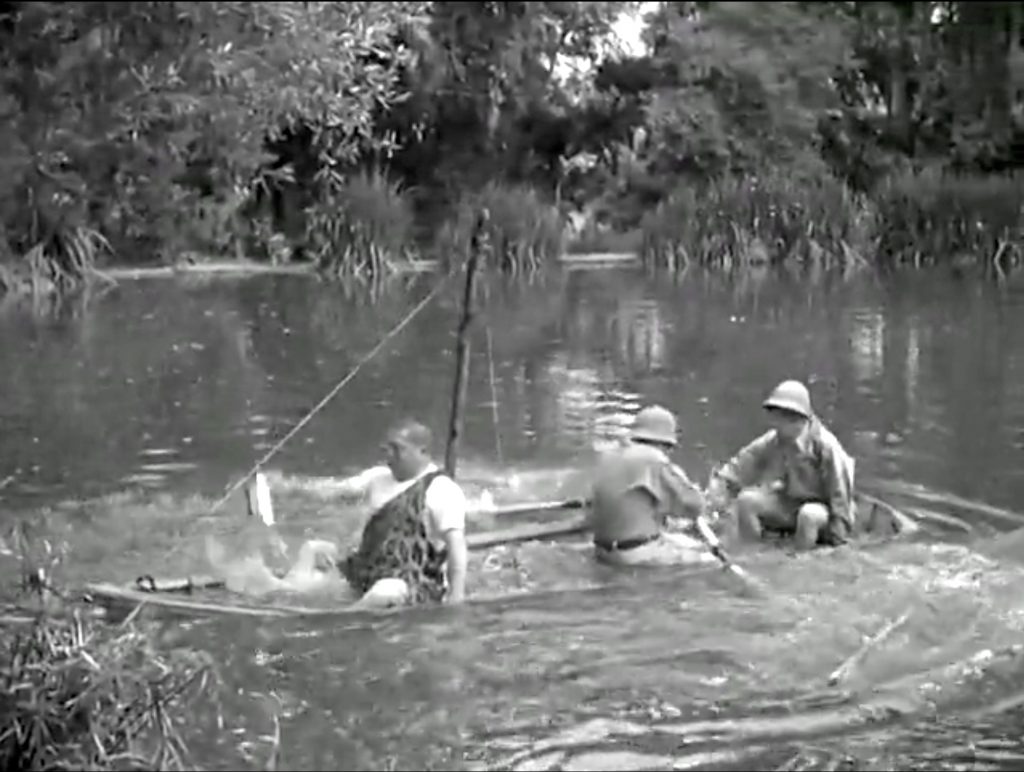 Curly Howard, Larry Fine, Moe Howard in a soggy escape in "Some More of Samoa"