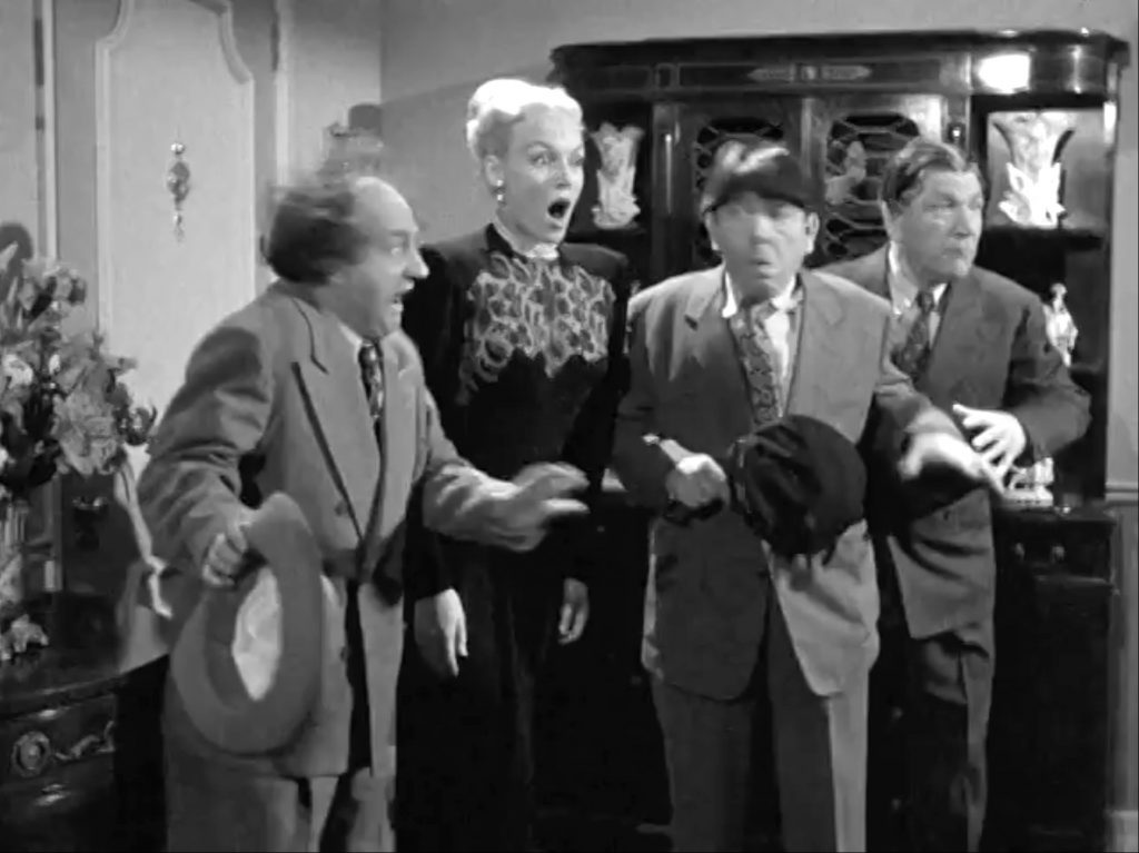 The Three Stooges and their babysitting client are surprised by …