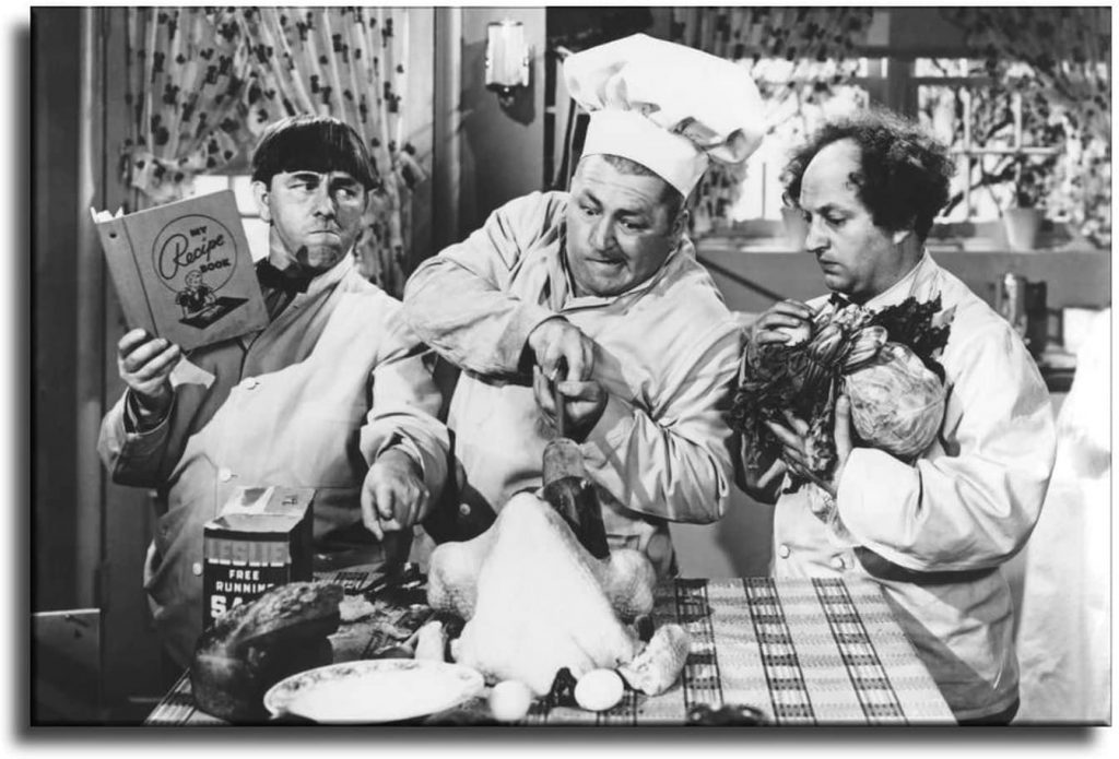 The Three Stooges (Moe Howard, Curly Howard, Larry Fine) cooking a turkey in "An Ache in Every Stake"