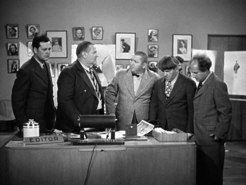 Vernon Dent of Whack magazine with his three reporters - Moe Howard, Larry Fine, Curly Howard